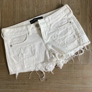 Used distressed white jean shorts Express size 2